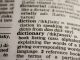 Dictionary photo to illustrate the release of a definition framework by the Open Source Initiative to evaluate whether AI systems can be classified as open-source or if there are restrictions to artificial intelligence systems.
